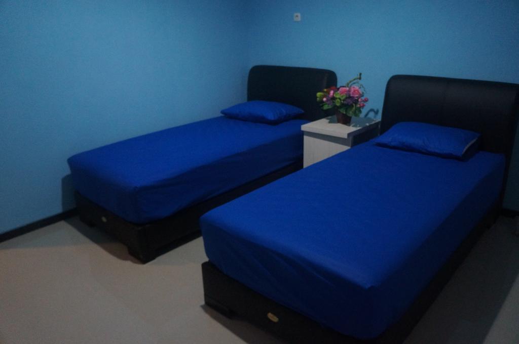 Budget Guest House Tunas Mandiri Jaya Μαλάνγκ Δωμάτιο φωτογραφία